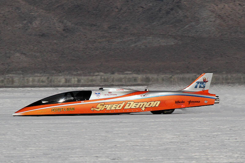 High-speed land racing car Speed Demon on salt flats during speed test