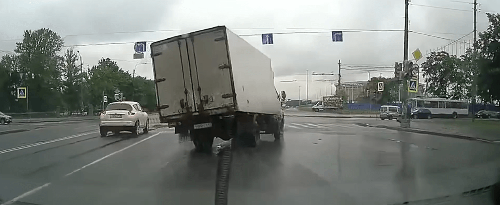 Truck swerving on slippery road highlights loss of control and need for defensive driving