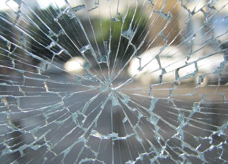 Shattered windshield glass symbolizing impaired driving vision and safety risk
